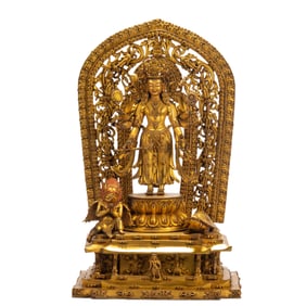 A BRONZE -GILT STANDING BODHISATTVA
