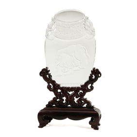 A FINE CARVED ROCK CRYSTAL VASE TABLE SCREEN