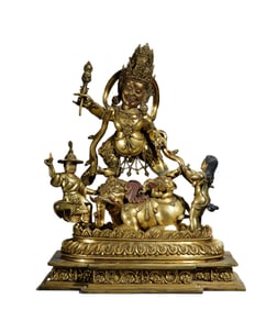 A BRONZE-GILT PROTECTOR