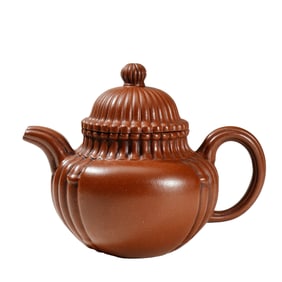 A YIXING GLAZE ZISHA TEAPOT