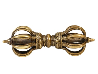 A TIBETAN BRONZE VAJRA