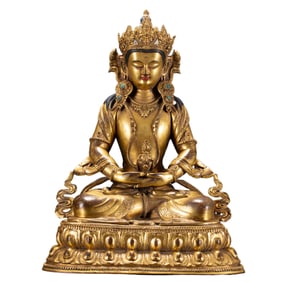 A BRONZE-GILT SEATED AMITAYUS