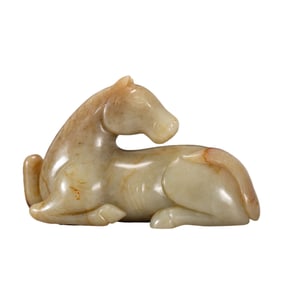 A CARVED JADE HORSE