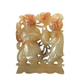 A CARVED STANDING FIGURES