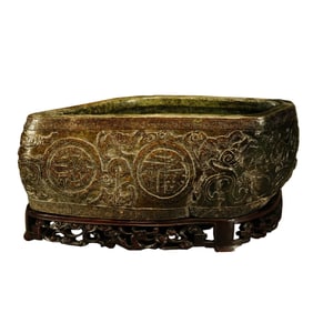 A LARGE CARVED JADE LONGEVITY WASHER