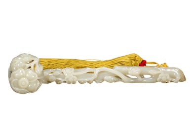 A CARVED WHITE JADE RUYI SCEPTER