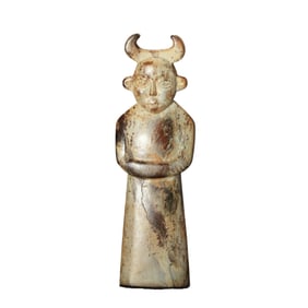 A JADE CARVING OF MYTHICAL FIGURE