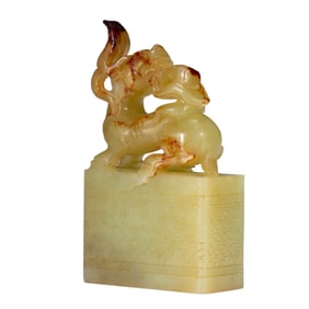 A CARVED JADE DRAGON SEAL