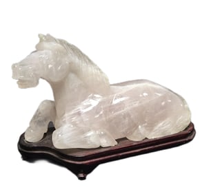 A VERY LARGE CHINESE ROSE QUARTZ RECUMBENT HORSE