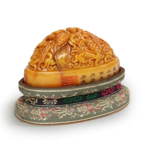 A CARVED CHILONG GROUP SEAL