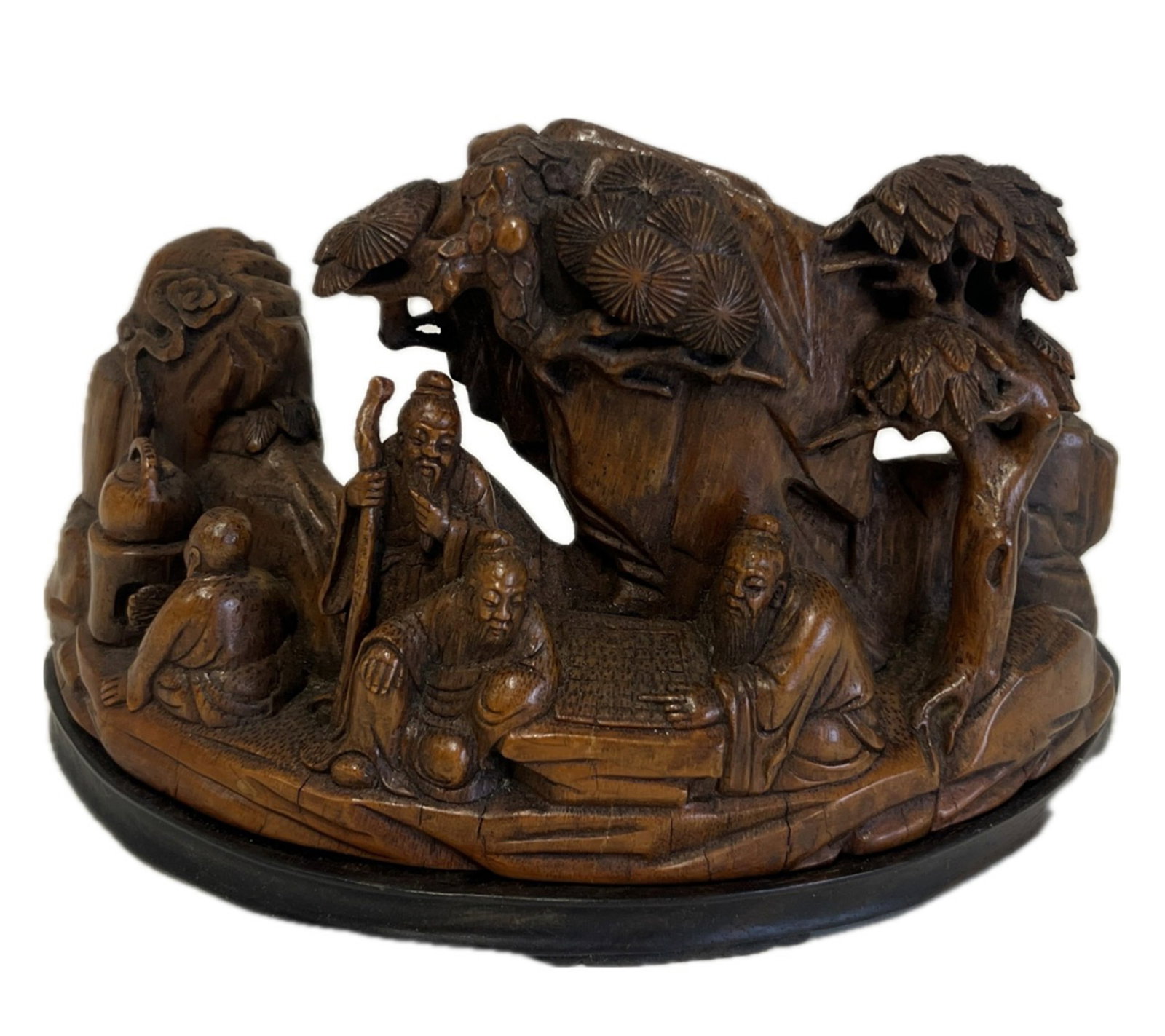 A CARVED BAMBOO DECORATION: A CARVED BAMBOO DECORATION Carved scholars gathering scene, with surface patina. DIMENSION: H. 10 cm. A LIST OF RECOMMENDED THIRD-PARTY SHIPPER IS AVAILABLE UNDER SHIPPING INFORMATION. PLEASE FEEL