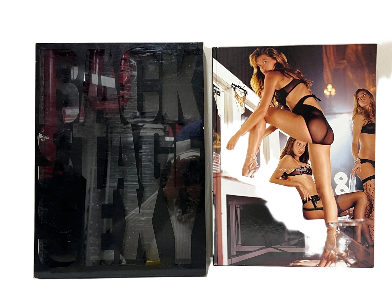 VICTORIAS SECRET 'SEXY BACKSTAG' COLLECTABLE BOOK: VICTORIAS SECRET 'SEXY BACKSTAG' COLLECTABLE BOOK WITH PLASTIC HARD CASE DIMENSION: A LIST OF RECOMMENDED THIRD-PARTY SHIPPER IS AVAILABLE UNDER SHIPPING INFORMATION. PLEASE FEEL FREE TO CONTACT THEM