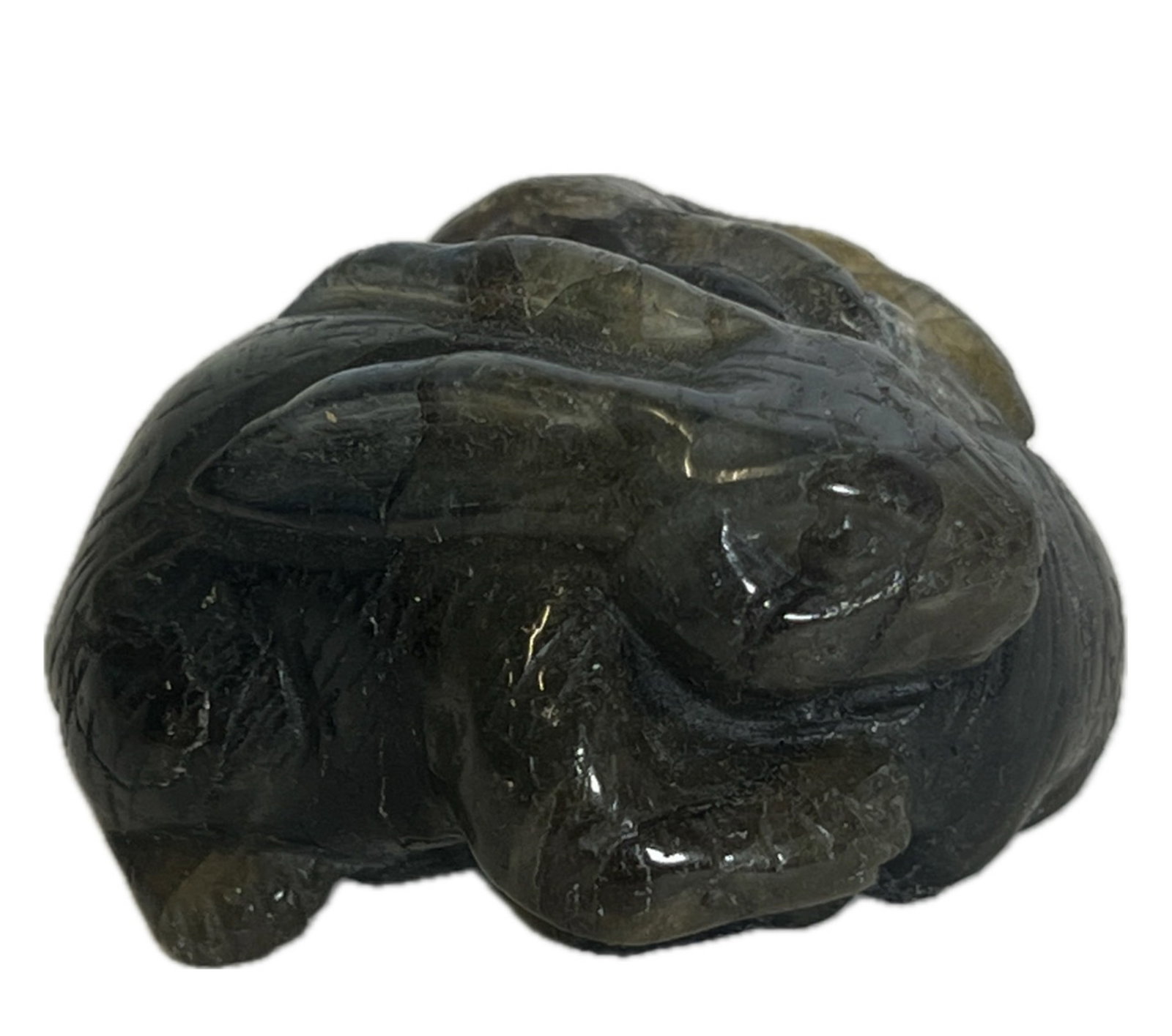 A CARVED STONE RABBIT: A CARVED STONE RABBIT Carved in round, the stone is of gray tone, with russet veins. DIMENSION: L. 4.5 cm. A LIST OF RECOMMENDED THIRD-PARTY SHIPPER IS AVAILABLE UNDER SHIPPING INFORMATION. PLEASE FEE