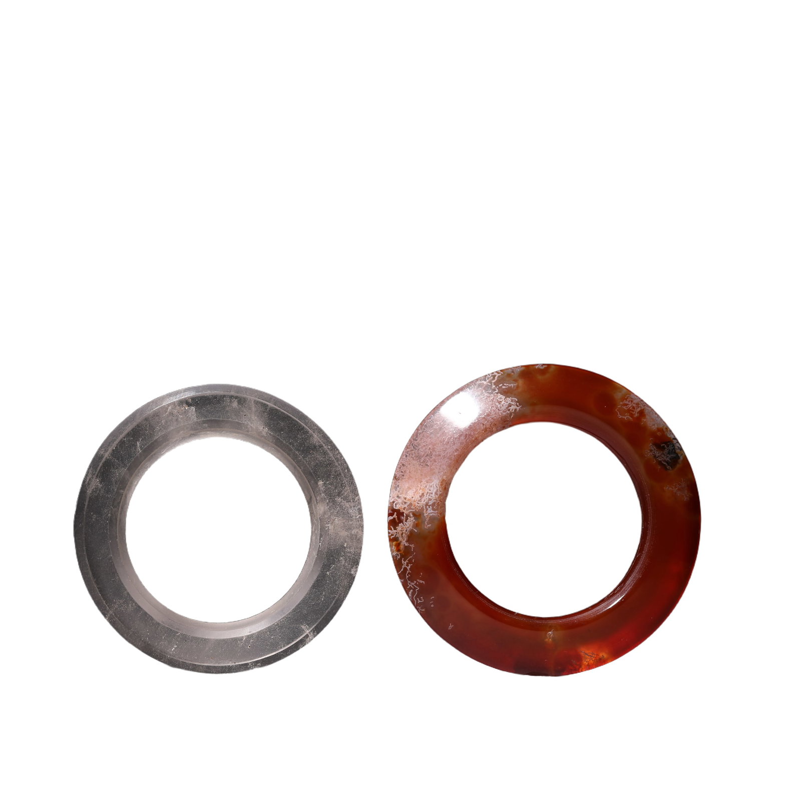 A ROCK CRYSTAL AND A CARNELIAN AGATE FACETED RING, HUAN (1 of 6)