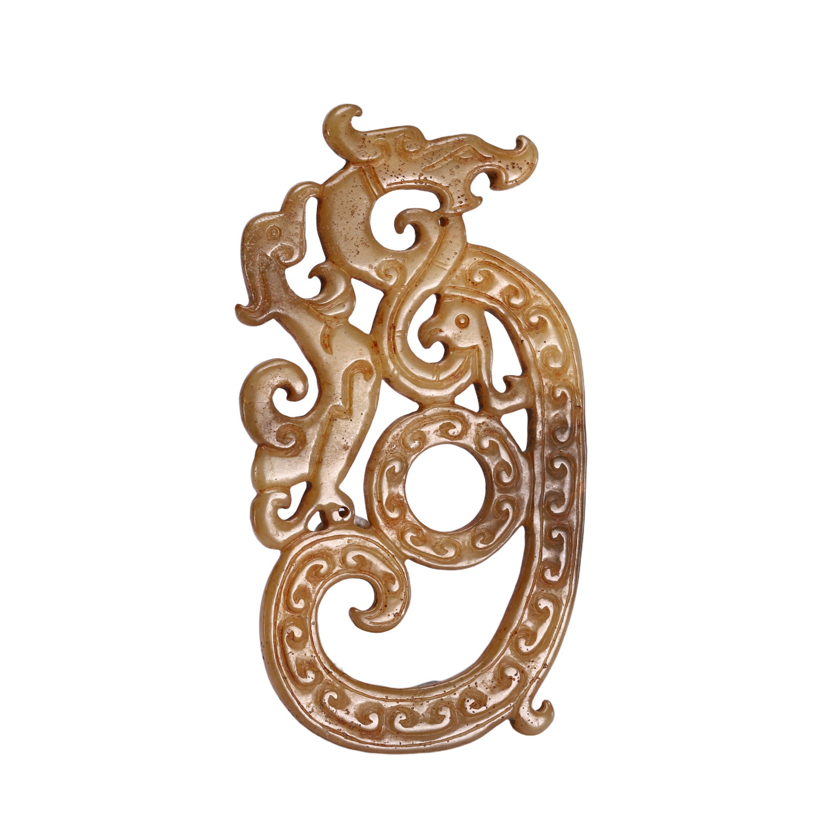 A CHINESE ARCHAISTIC CARVED JADE DRAGON PENDANT: A CHINESE ARCHAISTIC CARVED JADE DRAGON PENDANT Beautifully curved into an S-shape, matching pendants of high quality such as the present lot are rare and would have been reserved for those of