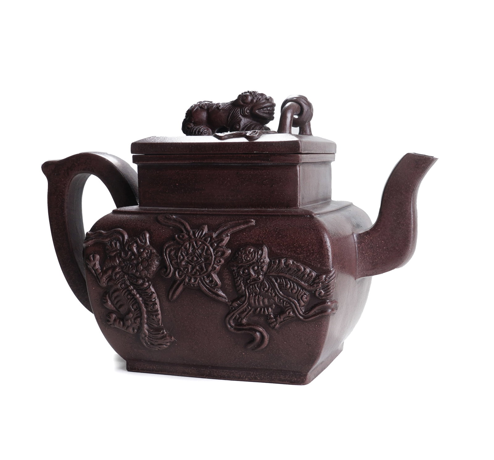 A YIXING GLAZE ZISHA TEAPOT WITH COVER: A YIXING GLAZE ZISHA TEAPOT WITH COVER The facet baluster teapot is carved with a curved, tapering spout and a rounded handle, and the domed cover is surmounted by a recumbent beast finial. DIMENSION: