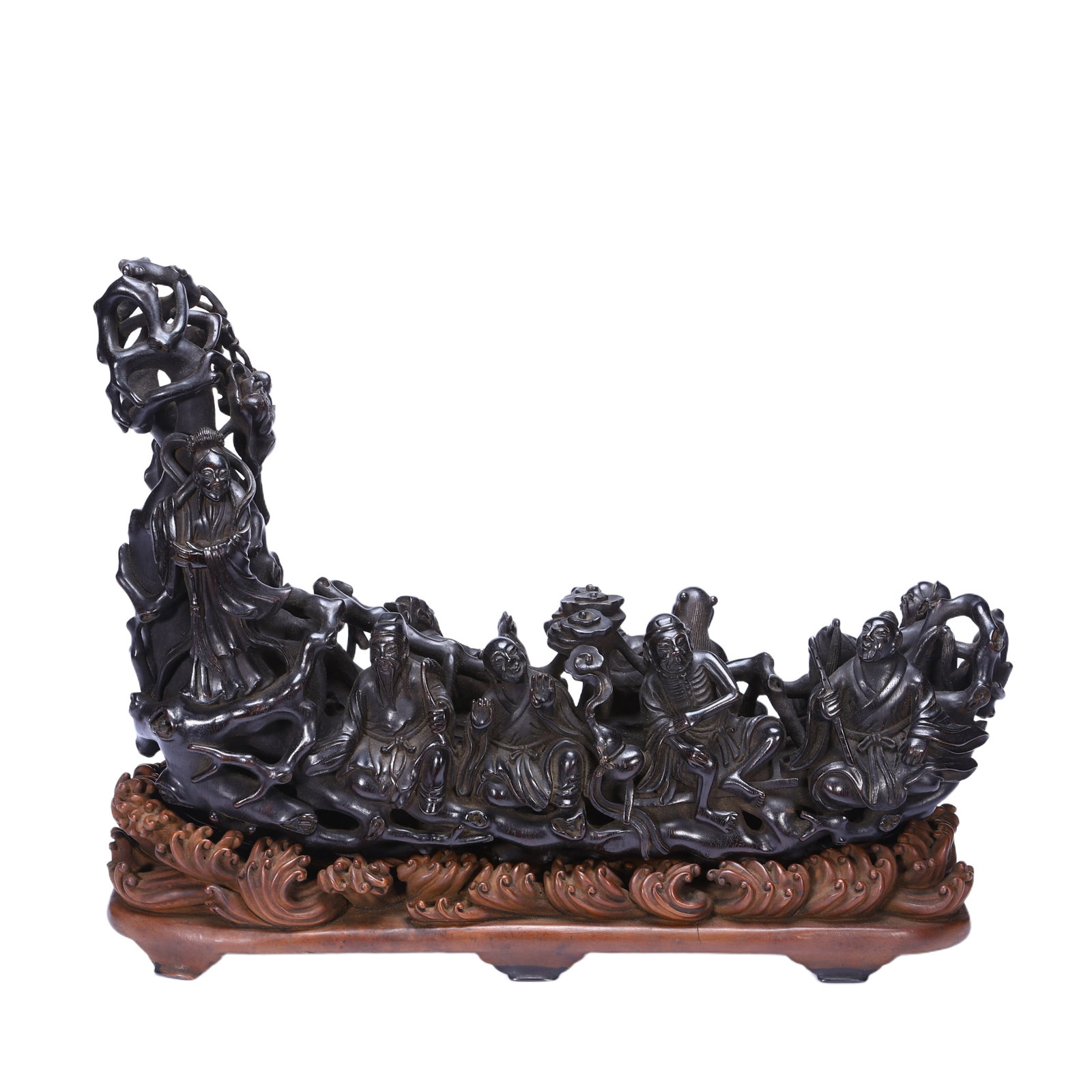 A CARVED ROSEWOOD ZITAN IMMORTALS GROUP DECORATION: A CARVED ROSEWOOD ZITAN IMMORTALS GROUP DECORATION Zitan is a general term which includes numerous species of wood, however, it is commonly agreed that it belongs to the genus Pterocarpus. A