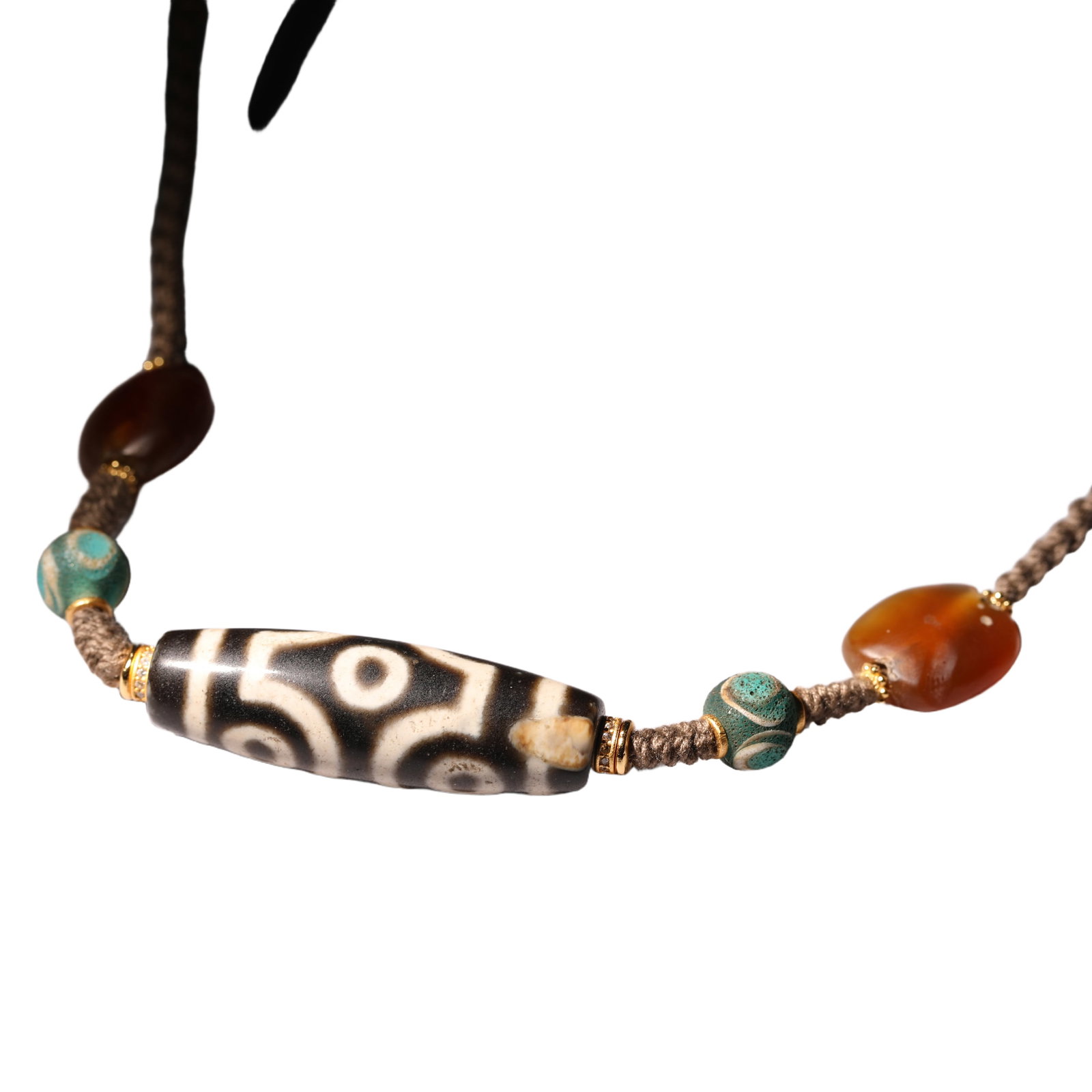 A TIBETAN DZI BEAD NECKLACE: A TIBETAN DZI BEAD NECKLACE Genuine tibet ancient agate dzi bead pendant, bead surface full of the sign of age, dzi bead is believed to be the best amulet in tibet, the bead of wealth and health.
