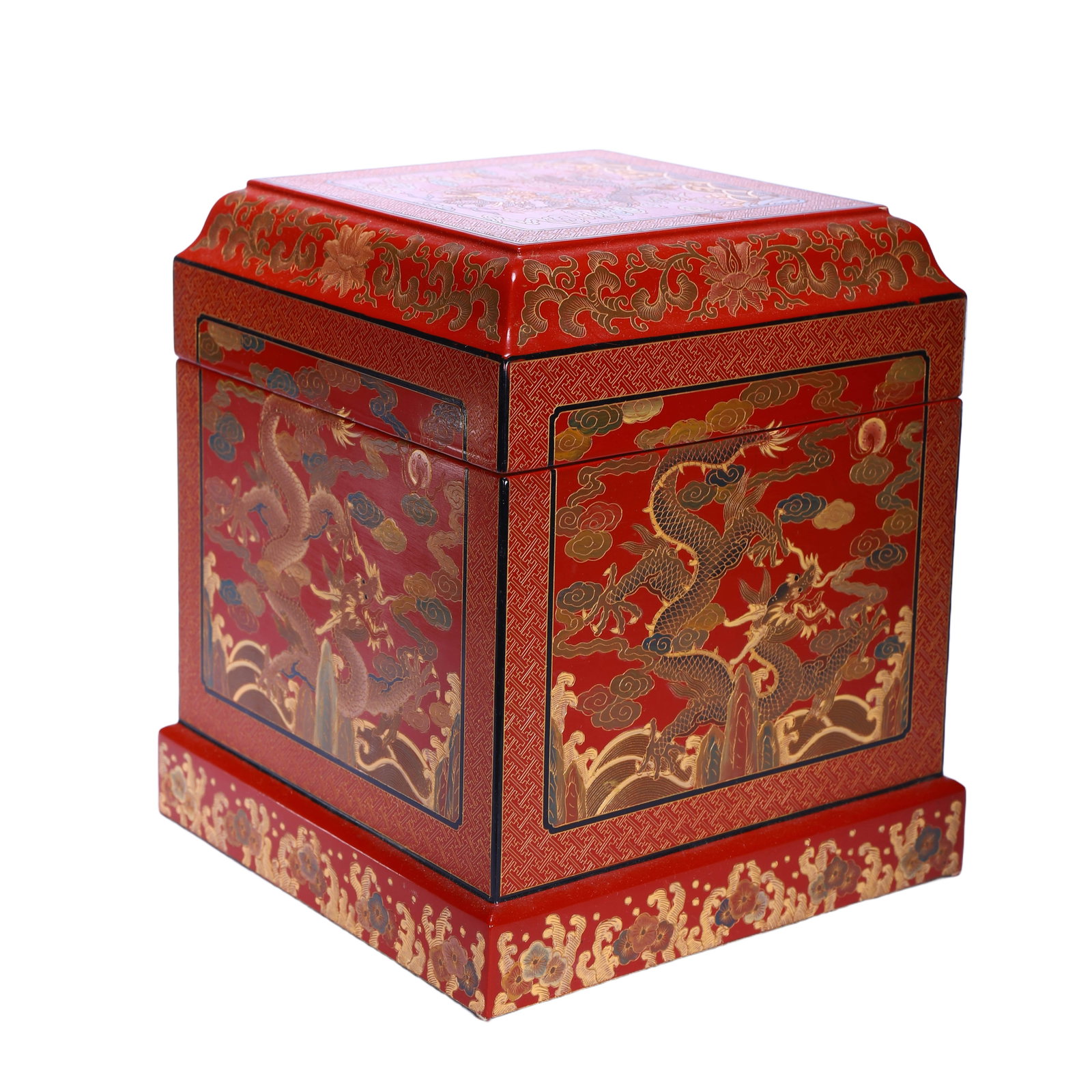 A POLYCHROME PAINTED LACQUER BOX WITH COVER: A POLYCHROME PAINTED LACQUER BOX WITH COVER Of squared shape, finley incised wrathful flying dragon above mountain and foaming waves. The dragon is associated with a wealth of legend and symbolism,