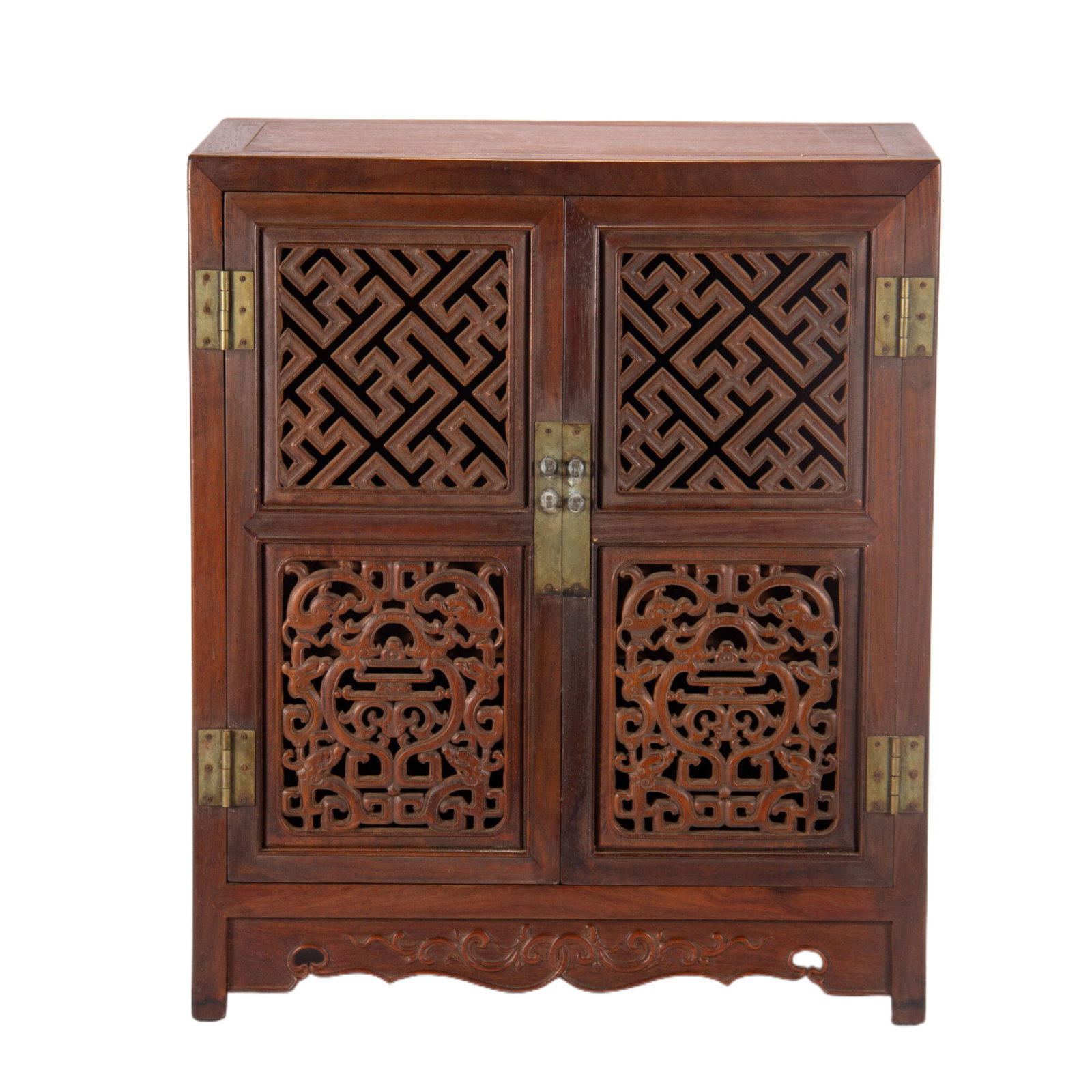 A CARVED AND RETICULATED HUANGHUALI CABINET: A CARVED AND RETICULATED HUANGHUALI CABINET Carved by huanghuali, showing off the extravagance of wealth to the most refined but subtle detail. DIMENSION: L. 43 cm. W. 25 cm. H. 50 cm. Weight 6920