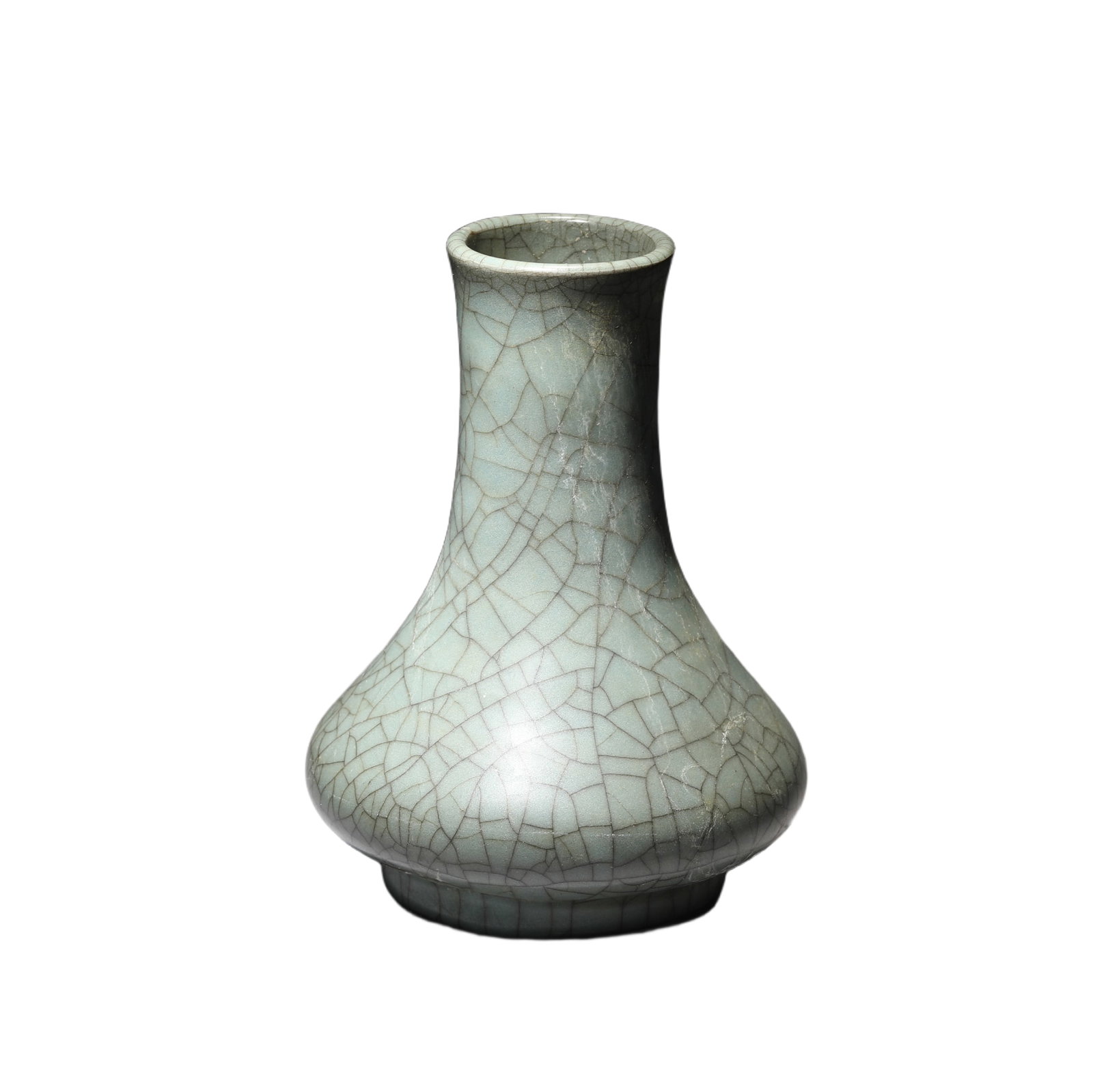 A GUAN-WARE CRACKLED VASE: A GUAN-WARE CRACKLED VASE Of compressed ovoid shape, covered overall with a pale greyish-blue glaze suffused with a network of golden and black crackles. DIMENSION: H:16.3cm; Diam:11.8cm; A LIST OF