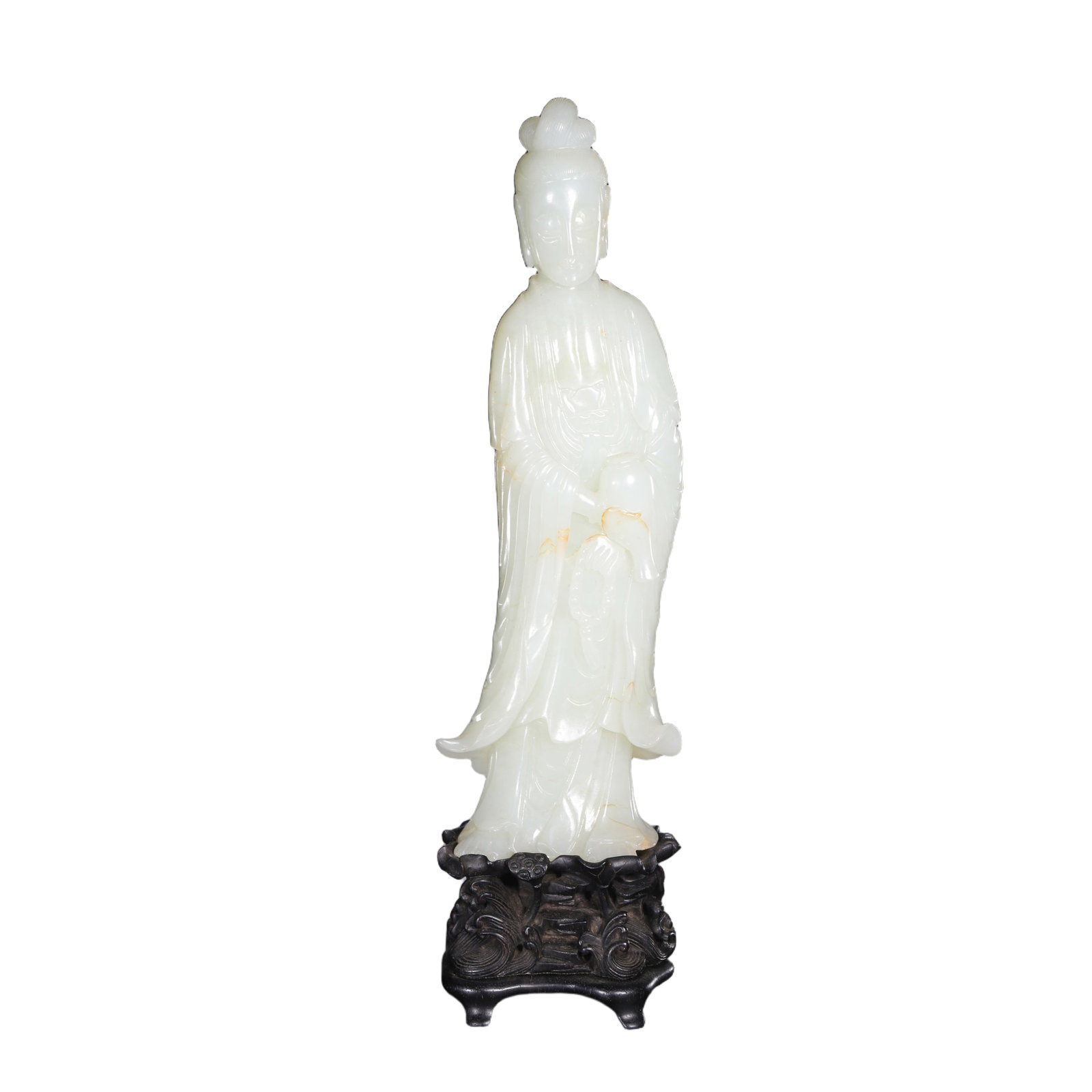 A FINE CARVED WHITE JADE STANDING GUANYIN: A FINE CARVED WHITE JADE STANDING GUANYIN In sanskrit, Avalokiteshvara means 'the lord who looks upon the world with compassion', and can be identified by the small figure of Amitabha Buddha that cent