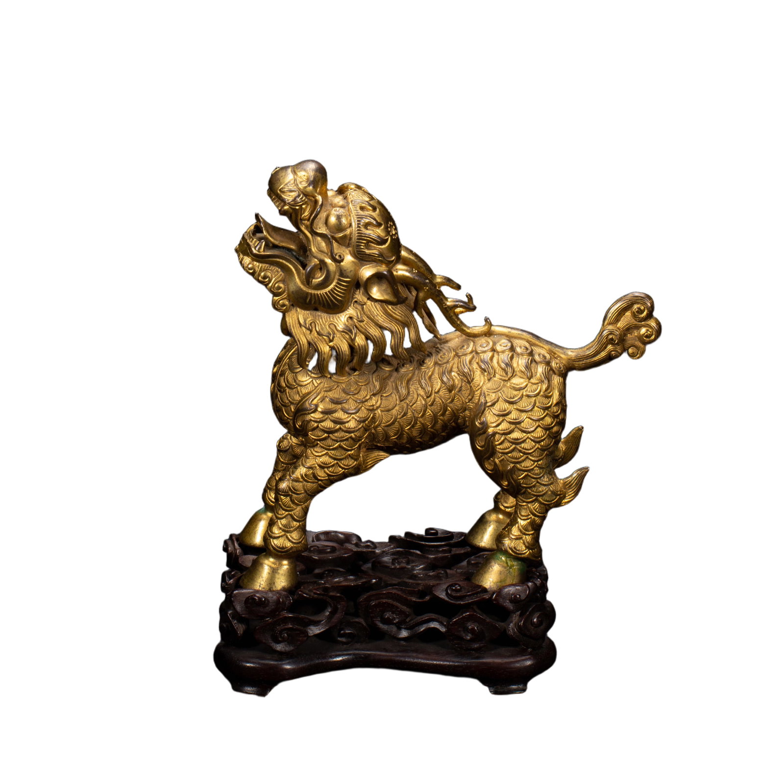 A BRONZE-GILT MYTHICAL BEAST KYLIN: A BRONZE-GILT MYTHICAL BEAST KYLIN The Qilin is a mythical creature in Chinese culture, also described as the ?Chinese Unicorn?. it normally has two horns but may have one or three and a deer's body b