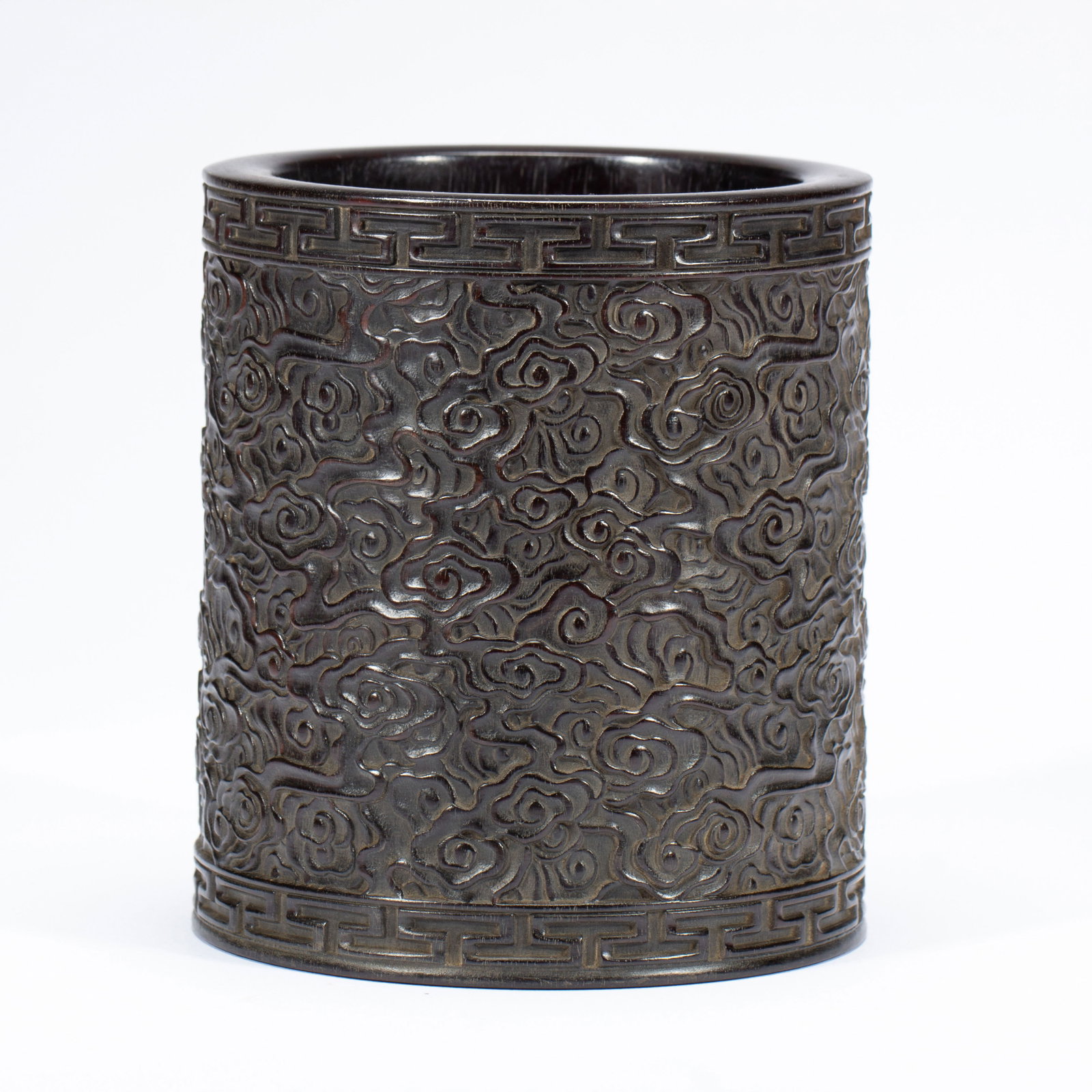 A CARVED ROSEWOOD ZITAN BRUSHSPOT: A CARVED ROSEWOOD ZITAN BRUSHSPOT Zitan is a general term which includes numerous species of wood, however, it is commonly agreed that it belongs to the genus Pterocarpus. A purplish-black,