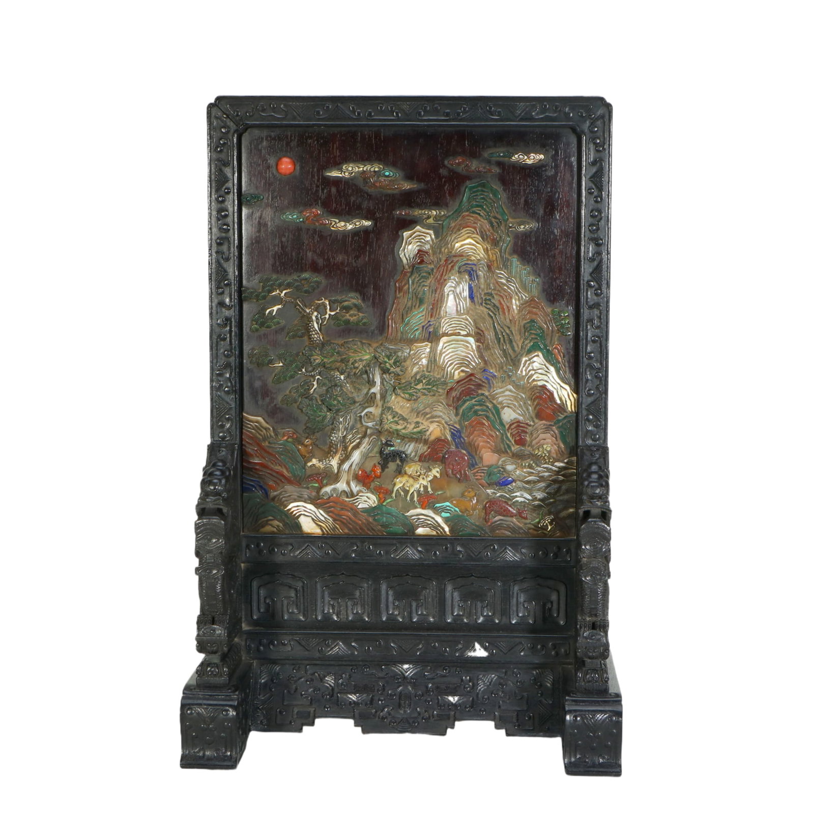 A FINE HARDSTONES INLAID CARVED ROSEWOOD ZITAN TABLE SCREEN: A FINE HARDSTONES INLAID CARVED ROSEWOOD ZITAN TABLE SCREEN Within a carved rosewood zitan frame, a carved hardstones inlaid panel depicting landscape. DIMENSION: HEIGHT: 42cm WIDE: 28cm A LIST OF REC