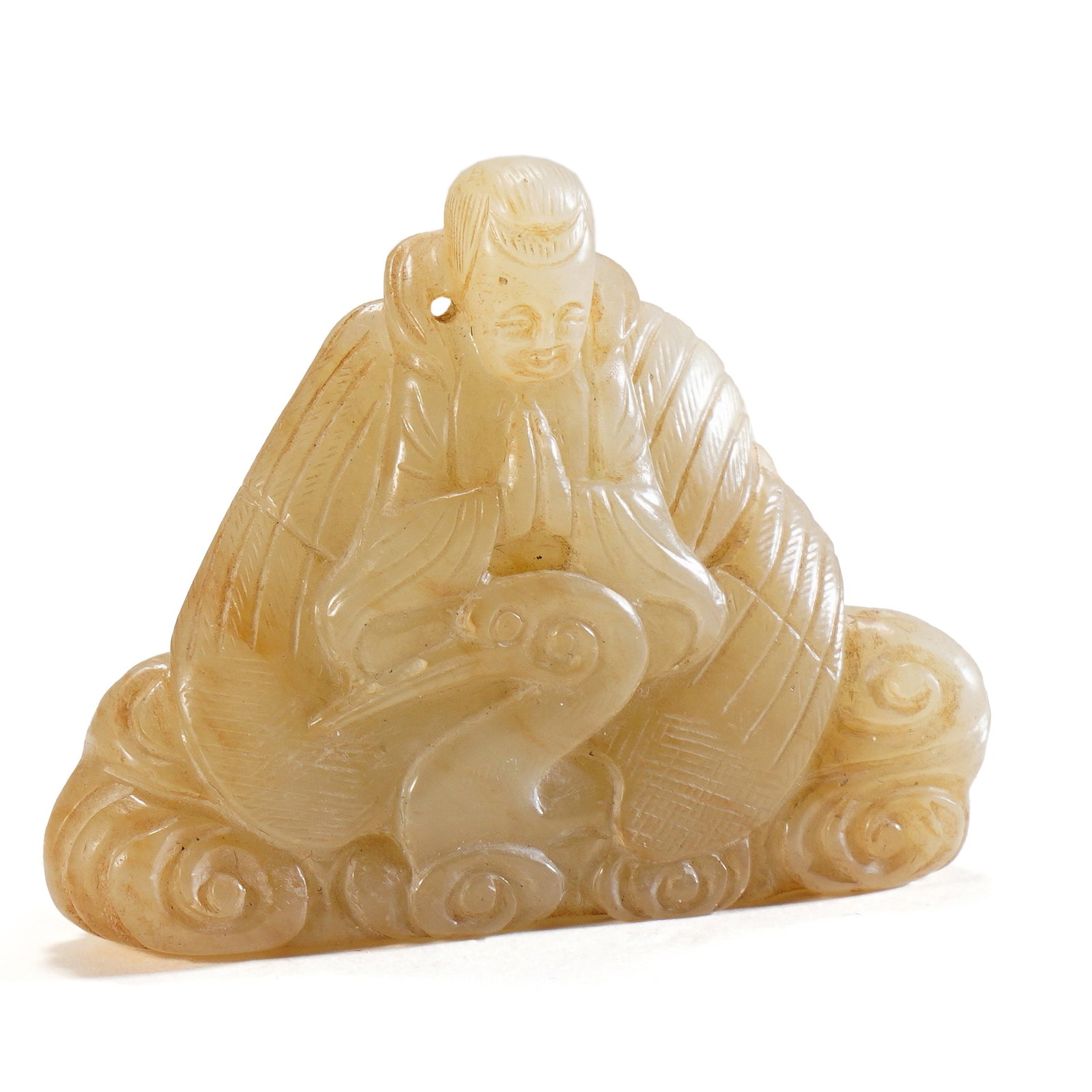 A CARVED WHITE JADE IMMORTAL: A CARVED WHITE JADE IMMORTAL Carved as the immortal seated on a crane, the stone is of warm white tone. DIMENSION: HEIGHT: 4.3cm WIDE: 5.5cm A LIST OF RECOMMENDED THIRD-PARTY SHIPPER IS AVAILABLE UNDE