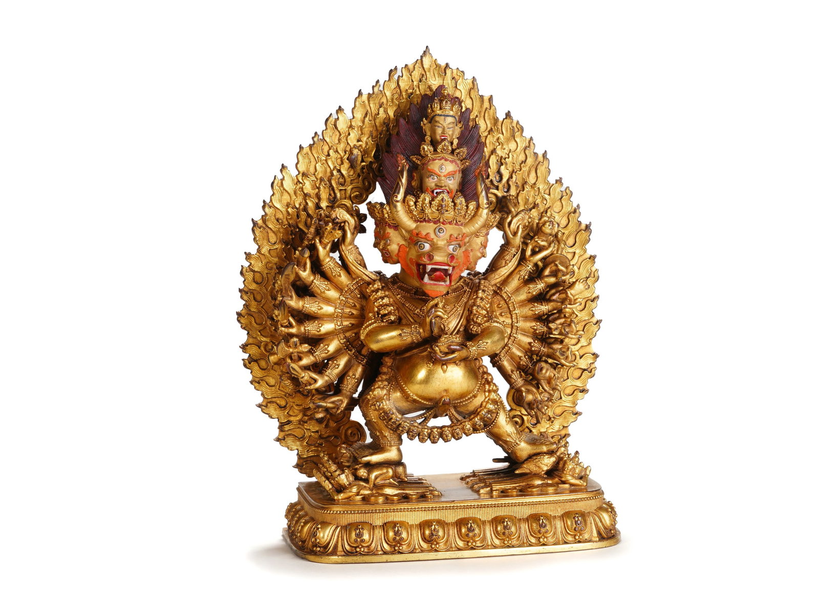 A RARE BRONZE-GILT YAMANTAKA: A RARE BRONZE-GILT YAMANTAKA Vajrabhairava Yamantaka is one of the eight protectors of Tibetan Buddhism. He is the terrifying form of Manjushri, the God of Wisdom, whose head is visible in the flaming