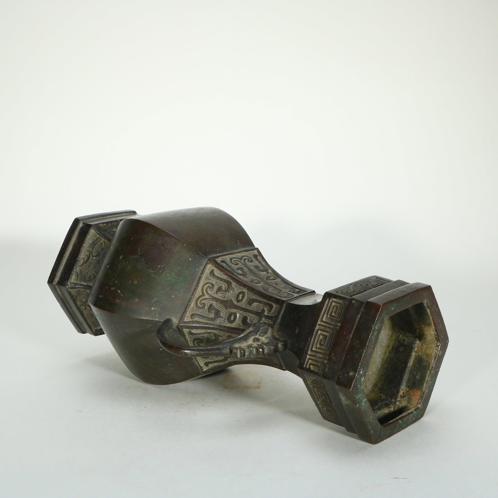 A BRONZE HEXAGONAL VASE - 6