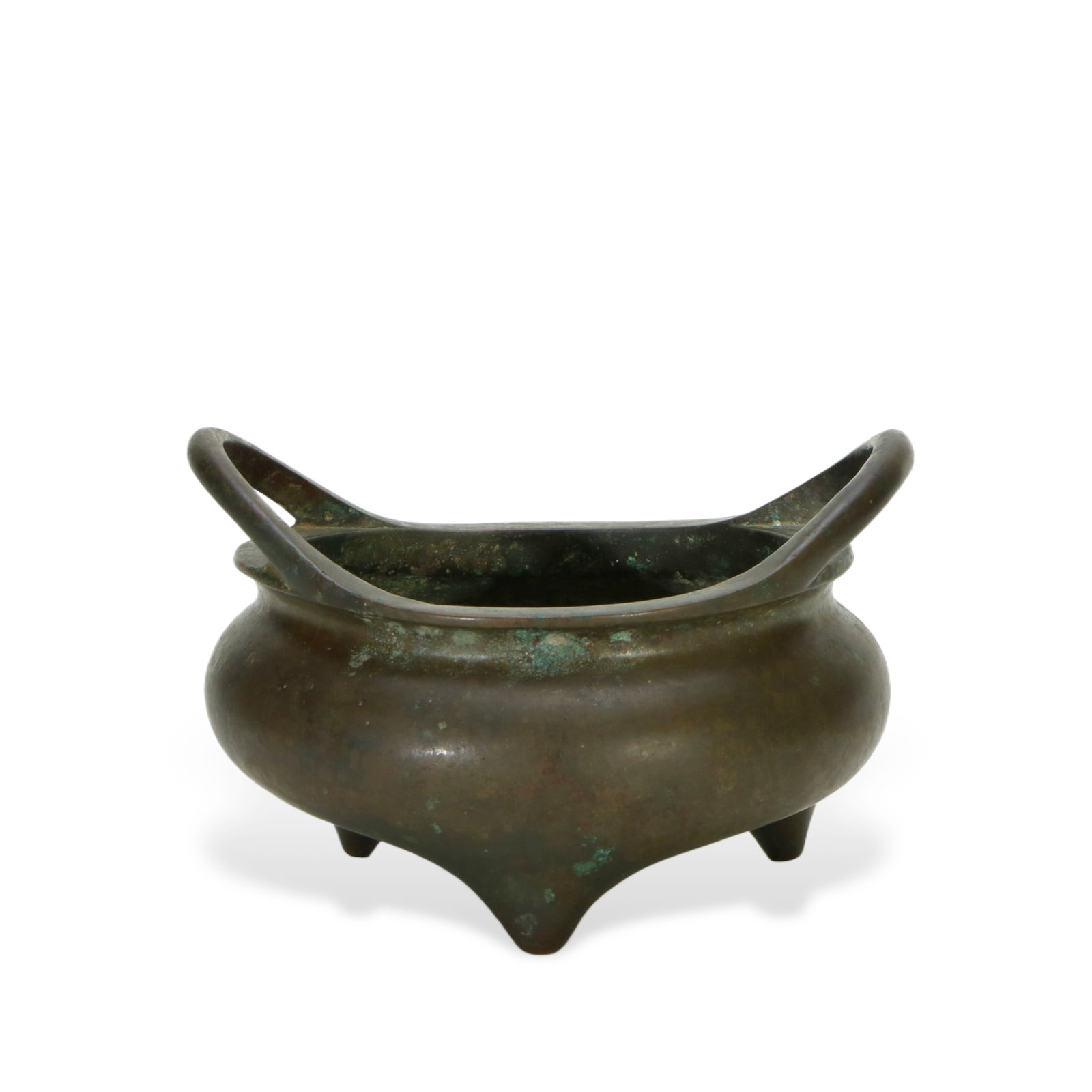 A BRONZE TRIPOD CENSER: A BRONZE TRIPOD CENSER The compressed body supported on three short feet, flanked with pair upright handles. DIMENSION: HEIGHT: 9cm WEIGHT: 15cm A LIST OF RECOMMENDED THIRD-PARTY SHIPPER IS AVAILABLE 