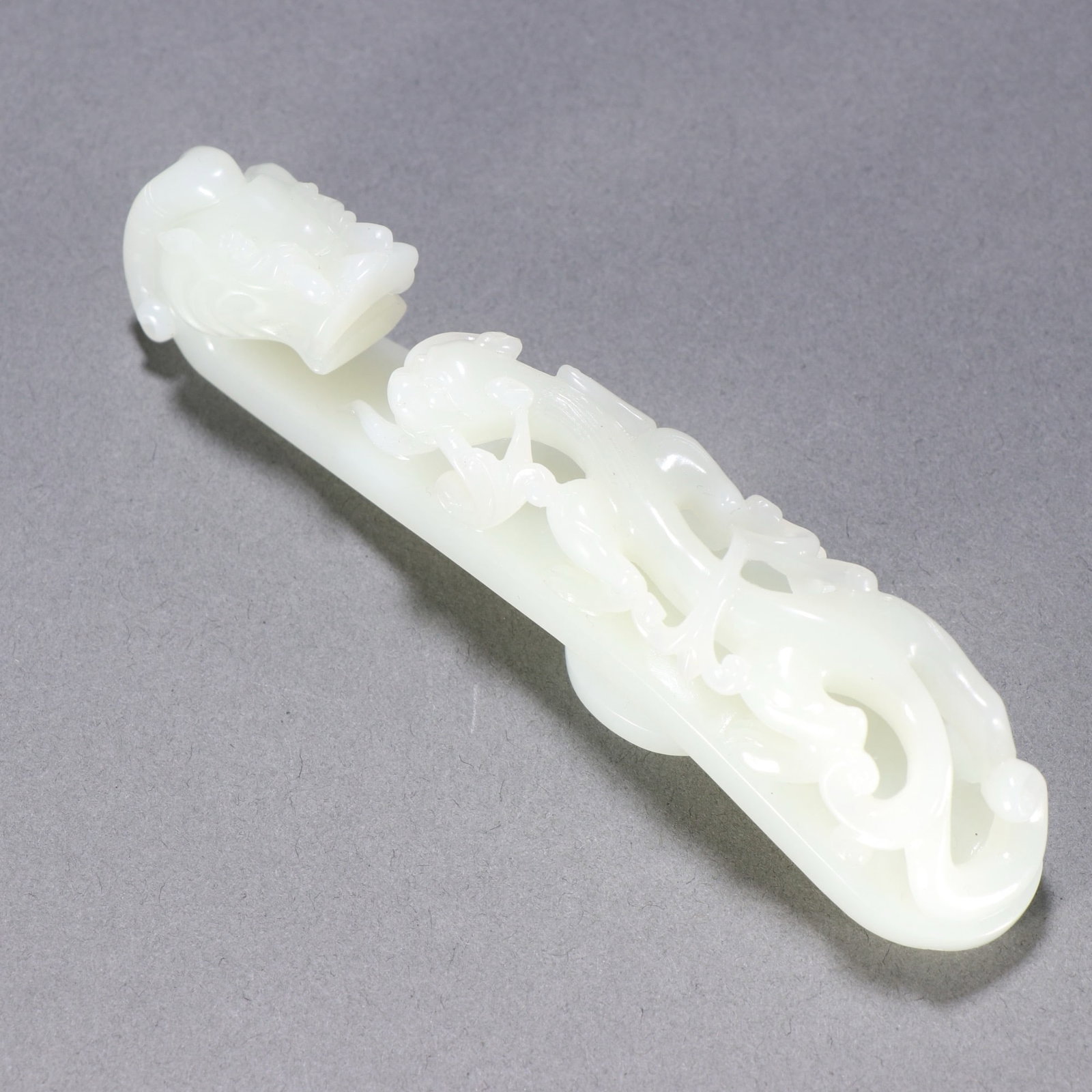 A CHINESE JADE BELT HOOK (1 of 9)