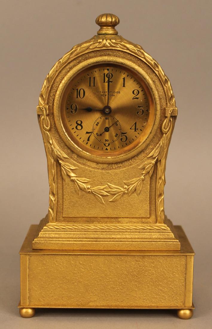 Tiffany Studios Bronze Shelf Clock: Tiffany Studios Bronze Shelf Clock on pedestal. Marked Tiffany Studios New York on face and back with the addition of 1832 on the back. 9"H x 5"W x 3 3/4"D