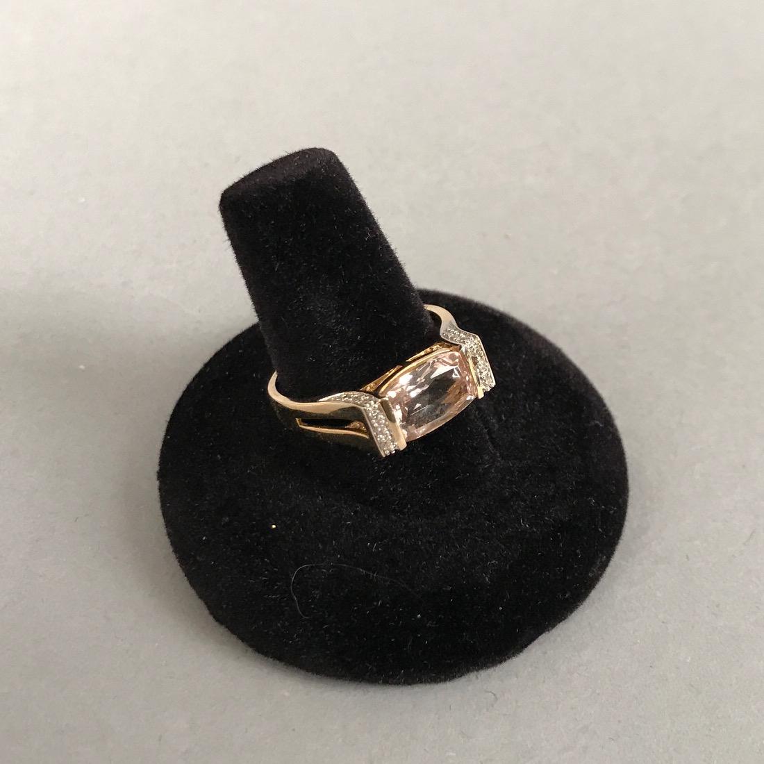 B&M 14K Gold Morganite & Diamond Ring: 14K Gold Ring with Pale Morganite Surrounded by Pave Diamonds. Marked 14K B&M. Size 9. Gross weight 4.1g. Shipping available within the continental United States (excludes insurance) for $25. Internat