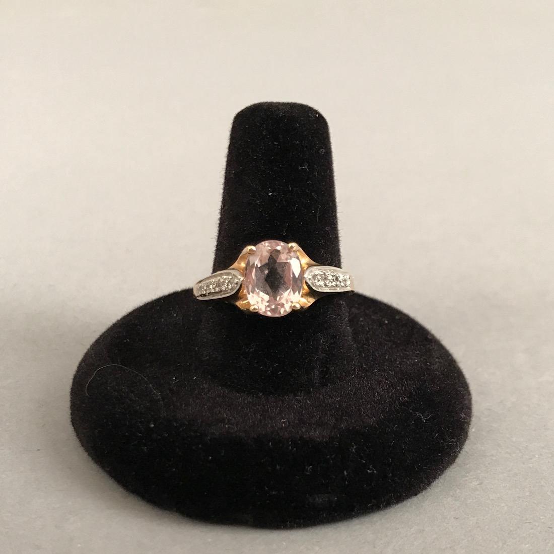 John C Rinker 14K Gold Morganite & Diamond Ring: John C Rinker 14K Gold Ring with Pale Morganite Surrounded by Diamonds. Marked 14K JCR. Size 8.75. Gross weight 3.3g. Shipping available within the continental United States (excludes insurance) for $