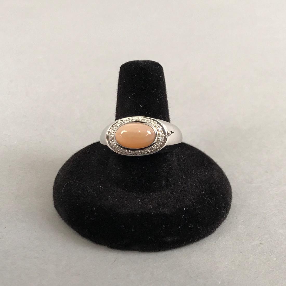 Sonia B 14K White Gold Chalcedony & Diamond Ring: Sonia B. 14K White Gold Ring with Pale Peach Chalcedony Surrounded by Pave Diamonds. Marked 14K Sonia B. Thailand. Size 9. Gross weight 7.1g. Shipping available within the continental United States (e