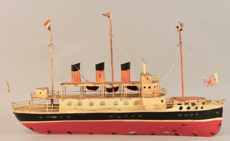 Tin British Cruise Ship Model: Tin British Cruise Ship Model with British flags and original paint. 24" L x 15" T