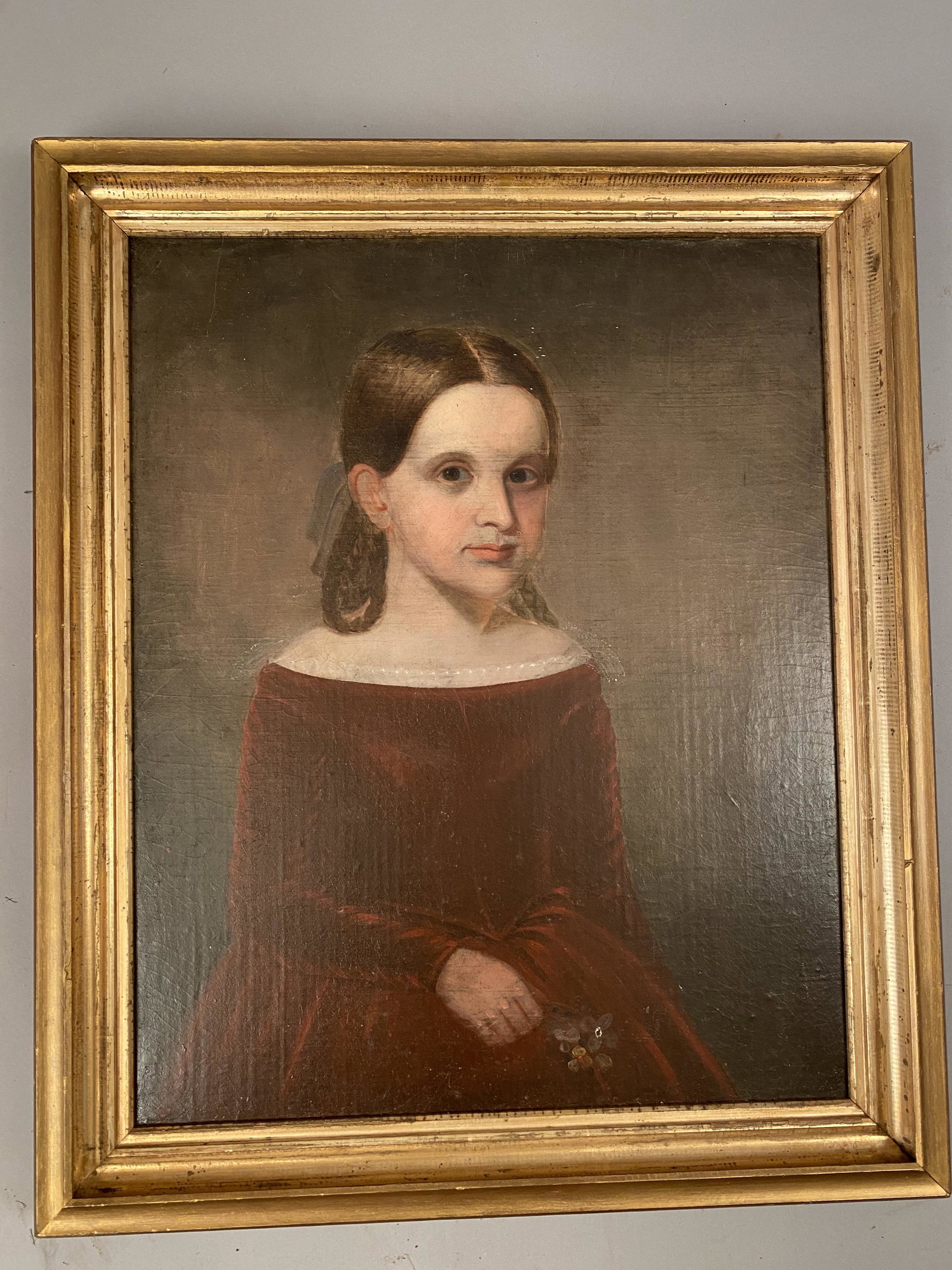 19th C Portrait Of A Young Girl in A Red Dress: 19th century portrait young girl in red dress with a lace collar holding flowers.Ê Relined. Frame 32Ò x 27Ò site 26 1/2Ò x 21 1/2Ò