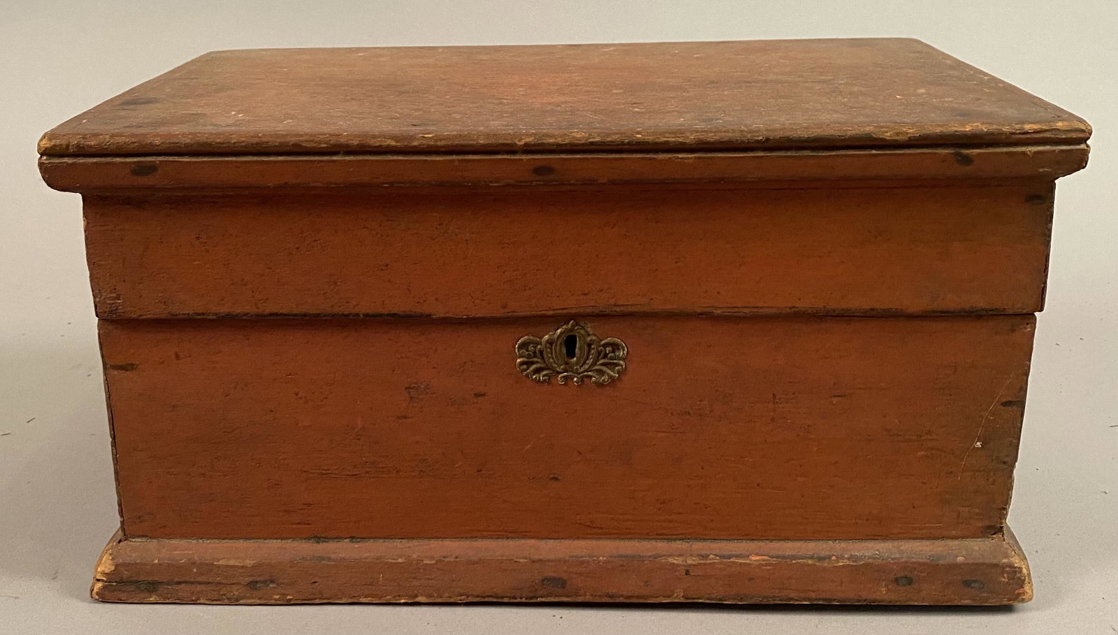 Small Red Lock Box w/Lift Top in Salmon Paint: Small red lock box with lift top and brass escutcheon in original salmon paint.