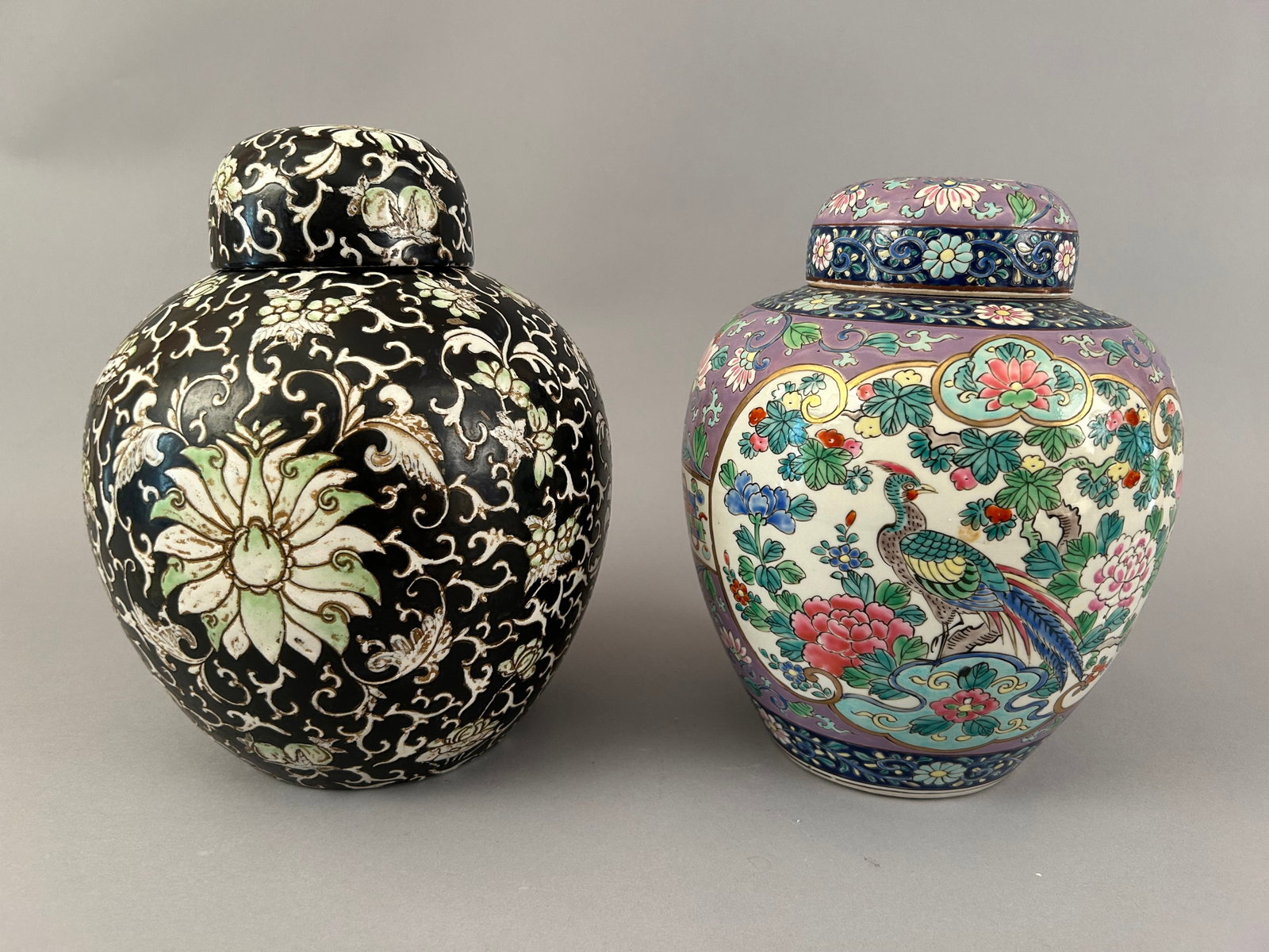Two Ginger Jars: Two ginger jars, one black and one purple. Both marked on bottom. Purple marked Nippon.