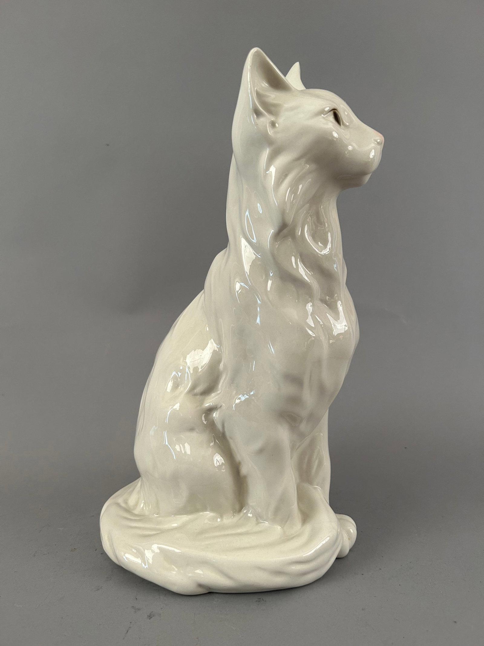 Royal Dux Porcelain Cat With A Pink Nose: Royal Dux porcelain cat with a pink nose. Marked on bottom.