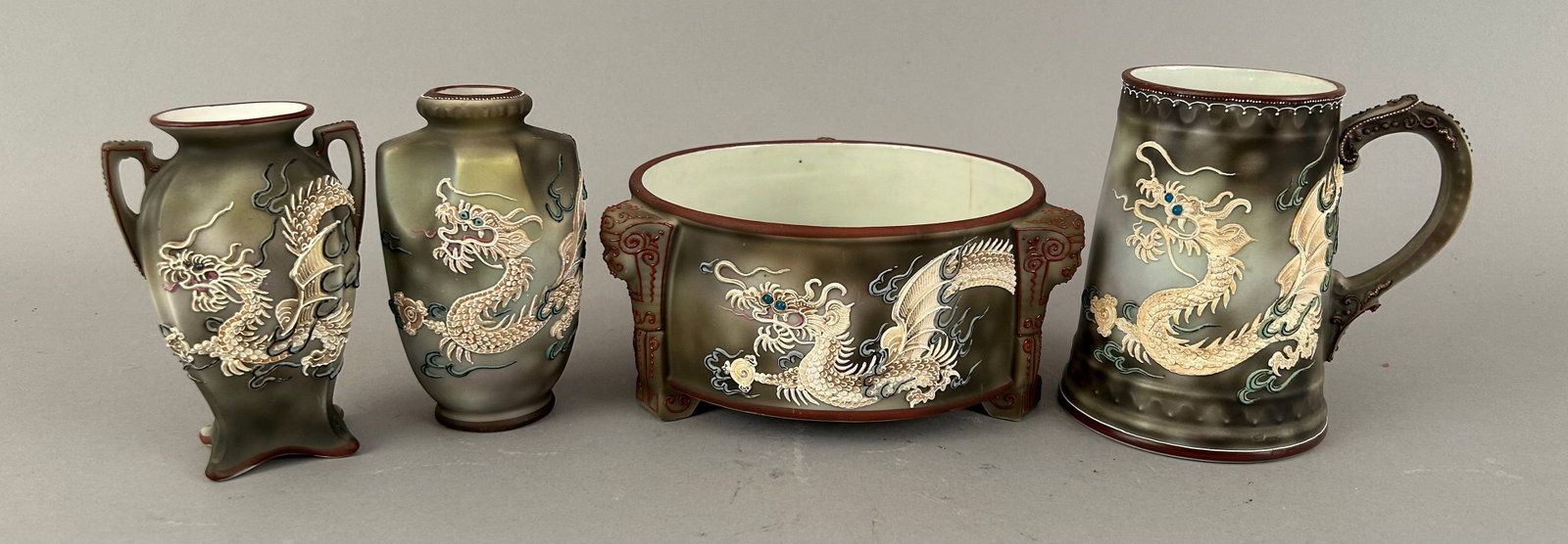 Four Pieces Moriage Dragonware: Four pieces Moriage Dragonware including two vases, a bowl/planter and a stein. All marked Handpainted Nippon on the bottom.