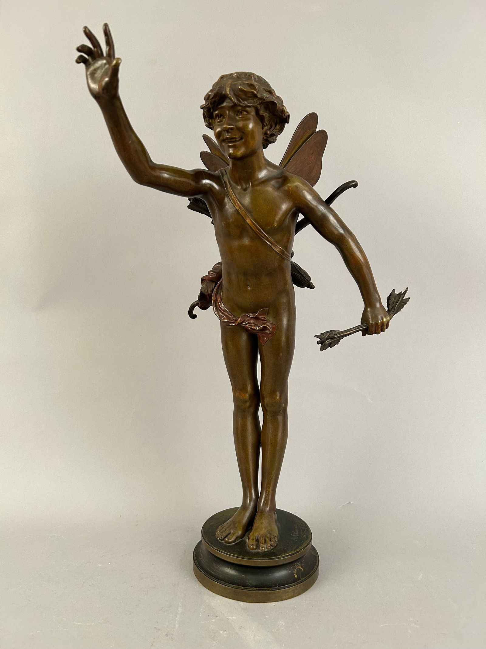 Bronze Cupid Fairy Boy Statue: Bronze Cupid fairy boy statue with bow and arrows. Signed on base A CHarron Salon De. 1888.