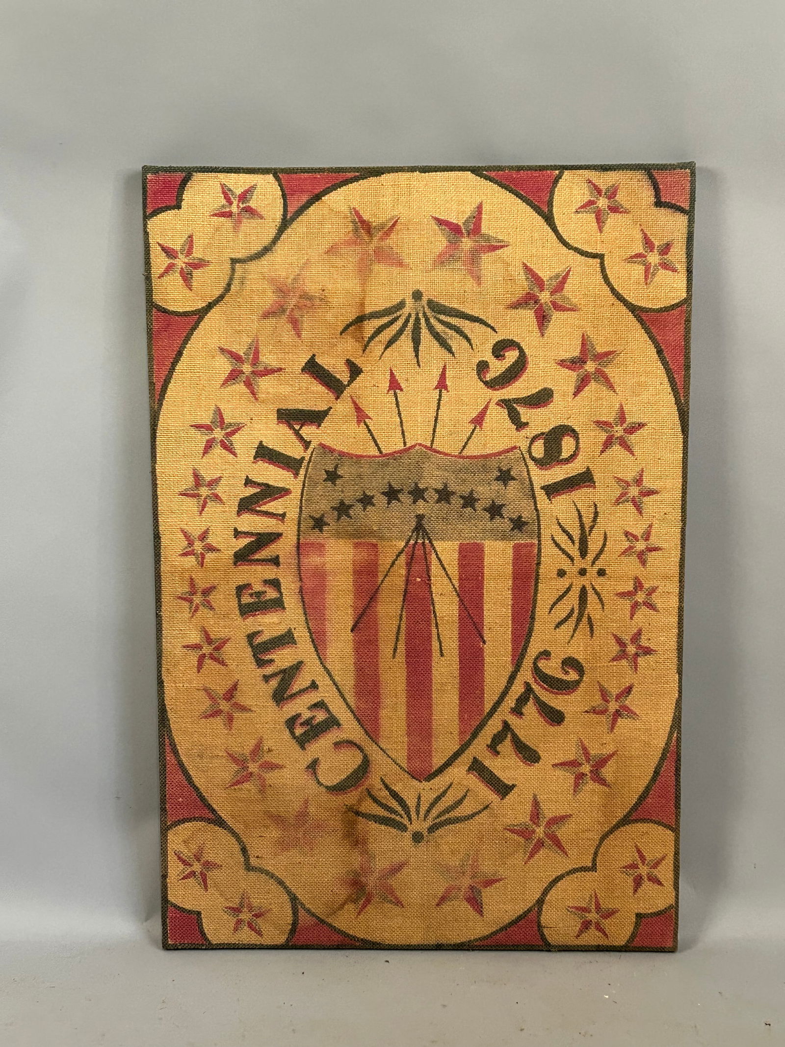 Centennial print on Burlap: Print on burlap, Centennial 1776-1886. Piece on back says "Frost Design Greenfield Village, Dearborn, Michigan number 95.