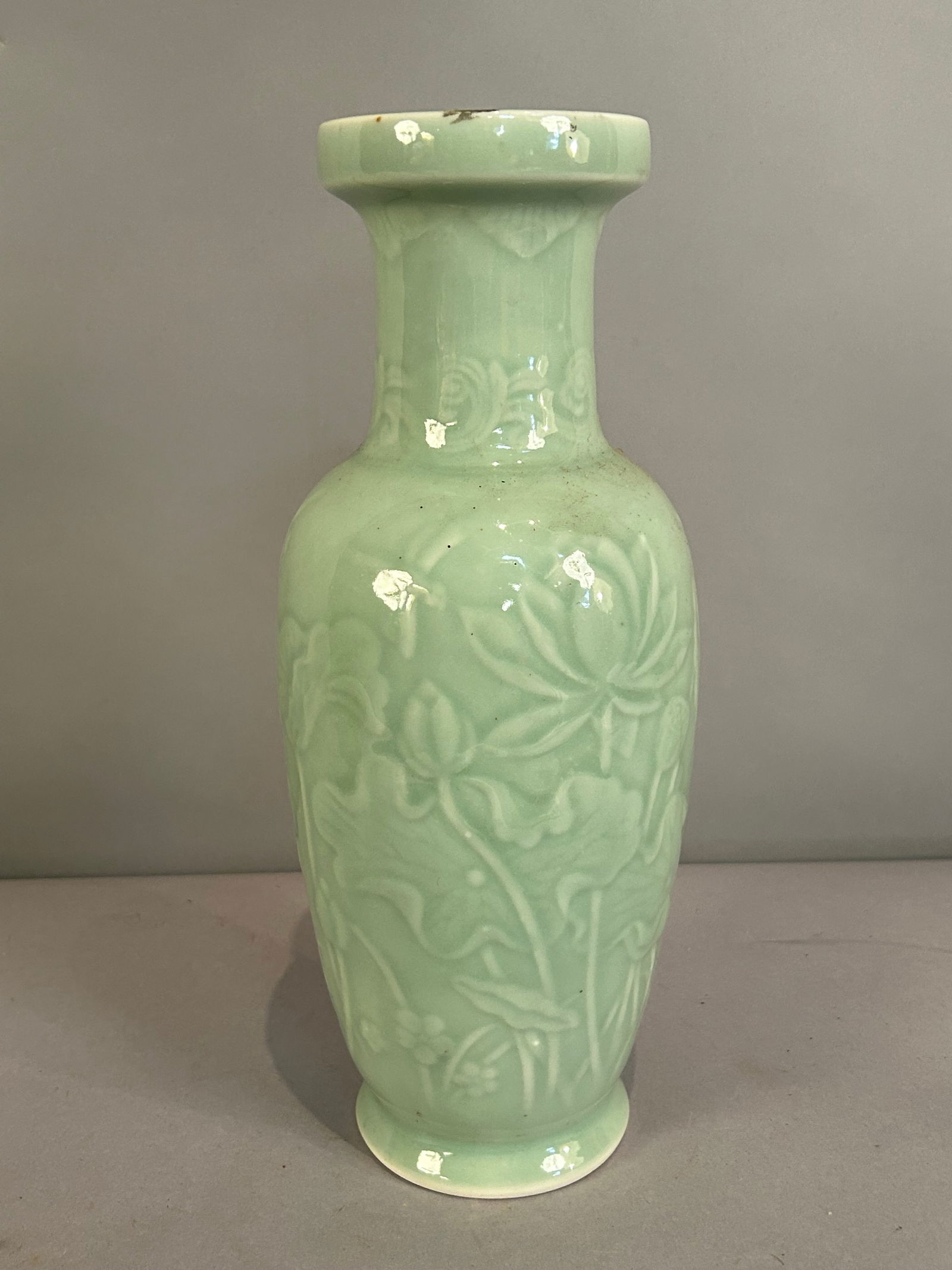 Antique Chinese Celadon Vase: Antique Chinese Celadon vase with floral design.