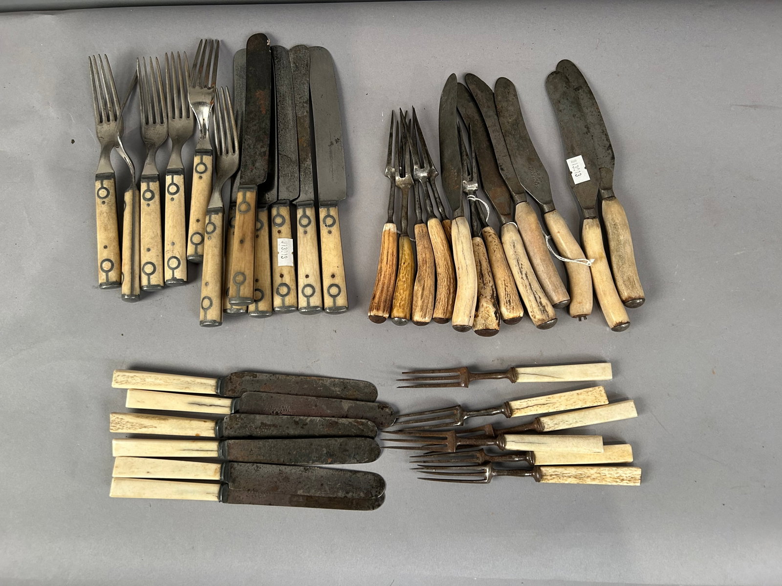 36 pcs Antique Bone Handled Flatware: 36 pcs Antique bone handled flatware includes set of six forks and six matching knives marked Cloverleaf cutlery company, six forks and six knives marked Isaac south cast steel, and six forks and six 