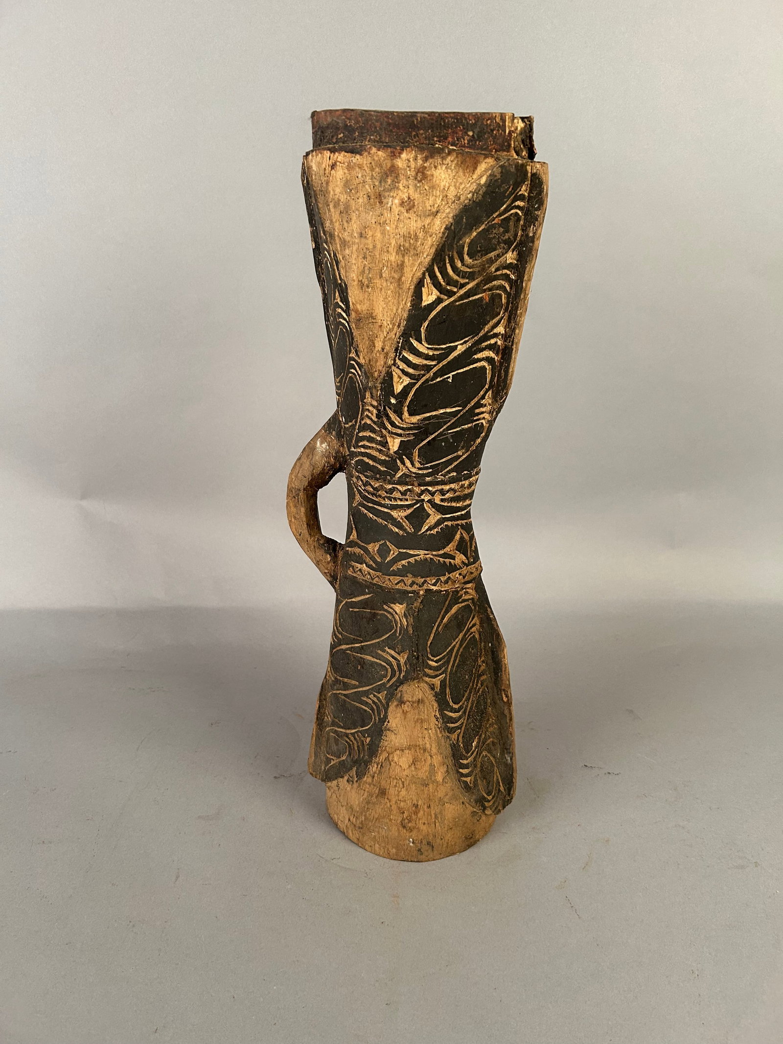 African 2 sided vessel w carved details: African 2 sided vessel w carved details 20.5x5 inches