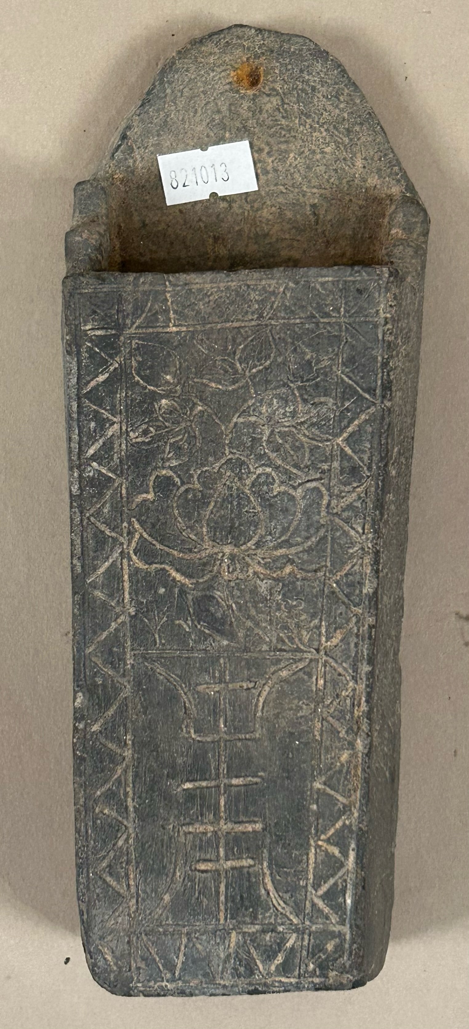 Pottery Wall Box w Carved Design: Pottery wall box with carved design on front and holes in bottom. Made to look like carved stone.